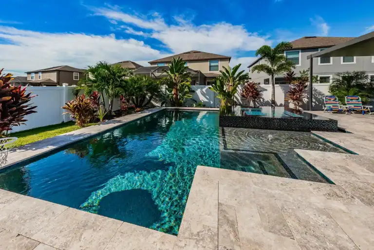 Modern pool cost in tampa with hot tub